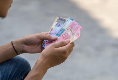 Terkuak! Ancaman Denda Rp200 Juta Menanti Penolak Rupiah Tunai